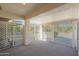 Covered patio with lattice walls offering shade and privacy at 14422 W Via Tercero --, Sun City West, AZ 85375