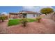 Artificial turf backyard with pergola and patio at 14805 W Caribbean Ln, Surprise, AZ 85379