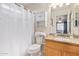 Clean bathroom with granite vanity and shower/tub combo at 14805 W Caribbean Ln, Surprise, AZ 85379