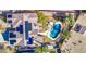 An aerial view of a house with a pool and solar panels in a residential area at 14905 W Dovestar Dr, Surprise, AZ 85374