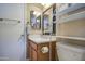 Bathroom with vanity, toilet and shelving at 14905 W Dovestar Dr, Surprise, AZ 85374