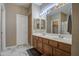 Primary bathroom with double vanity and plenty of counter space at 14905 W Dovestar Dr, Surprise, AZ 85374