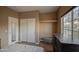 Bedroom with large closet and window at 14905 W Dovestar Dr, Surprise, AZ 85374