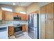 Well-equipped kitchen with stainless steel appliances and ample counter space at 14905 W Dovestar Dr, Surprise, AZ 85374