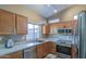 Well-equipped kitchen featuring stainless steel appliances and ample cabinetry at 14905 W Dovestar Dr, Surprise, AZ 85374