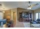 Living room featuring built-in shelving, hardwood floors, and comfortable seating at 14905 W Dovestar Dr, Surprise, AZ 85374