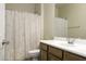 Clean bathroom with shower/tub combo and wood vanity at 1548 E Melrose Dr, Casa Grande, AZ 85122