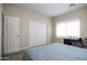 Bedroom with double bed and access to a closet at 1548 E Melrose Dr, Casa Grande, AZ 85122