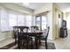 Dining area with backyard view and seating for four at 1548 E Melrose Dr, Casa Grande, AZ 85122