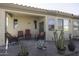 Covered patio with seating area and desert landscaping at 1548 E Melrose Dr, Casa Grande, AZ 85122