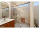 Updated bathroom with walk-in shower and grab bars at 16148 W Starlight Dr, Surprise, AZ 85374