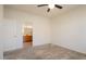 Comfortable bedroom with access to a full bathroom at 16148 W Starlight Dr, Surprise, AZ 85374