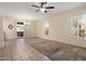 Dining room featuring tile floors, a chandelier, and sliding glass doors at 16148 W Starlight Dr, Surprise, AZ 85374