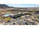 Aerial view of clubhouse, pool, and surrounding landscape at 18961 N 264Th Ave, Buckeye, AZ 85396