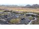 Aerial view of community amenities including parking and clubhouse at 18961 N 264Th Ave, Buckeye, AZ 85396