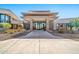 Modern community center entrance with stone and glass at 18961 N 264Th Ave, Buckeye, AZ 85396