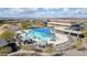 Resort-style pool with ample lounge chairs and shade structures at 18961 N 264Th Ave, Buckeye, AZ 85396