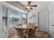 Cozy breakfast nook with a round table and window seating at 19611 N Stardust Blvd, Sun City West, AZ 85375