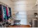 Walk-in closet with wire shelving and ample storage space at 19611 N Stardust Blvd, Sun City West, AZ 85375