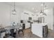 Well-lit kitchen with an island, stainless steel appliances, and modern pendant lighting at 20490 N 78Th Way, Scottsdale, AZ 85255