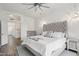 Serene main bedroom featuring neutral tones, a tufted headboard, and ample natural light at 20490 N 78Th Way, Scottsdale, AZ 85255