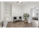 Cozy office space with shelving, bench, and a view into the bedroom at 20490 N 78Th Way, Scottsdale, AZ 85255