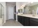 Bathroom with double vanity and walk-in shower at 21004 E Sunset Dr, Queen Creek, AZ 85142