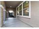 Covered entryway with arched entry and large windows at 21004 E Sunset Dr, Queen Creek, AZ 85142