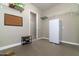 Storage room with shelving and mini-refrigerator at 21004 E Sunset Dr, Queen Creek, AZ 85142