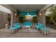 Comfortable seating area with colorful accents near the pool at 2323 N Central Ave # 504, Phoenix, AZ 85004