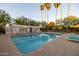 Inviting pool area with lounge chairs and umbrellas at 2323 N Central Ave # 504, Phoenix, AZ 85004