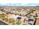 Aerial view of houses with solar panels and pools at 23776 N 167Th Ln, Surprise, AZ 85387