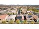 Aerial view of houses with solar panels and pools at 23776 N 167Th Ln, Surprise, AZ 85387