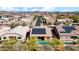 Aerial view of houses with solar panels and pools at 23776 N 167Th Ln, Surprise, AZ 85387