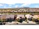 Community overview showcasing houses with tile roofs and mountain views at 23776 N 167Th Ln, Surprise, AZ 85387