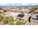 Aerial view of house with solar panels and pool at 23776 N 167Th Ln, Surprise, AZ 85387