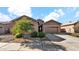 House with two-car garage and desert landscaping at 23776 N 167Th Ln, Surprise, AZ 85387