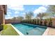 Private backyard with a refreshing pool, and grassy area at 23776 N 167Th Ln, Surprise, AZ 85387