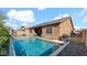 Relaxing pool area, adjacent to a house with solar panels at 23776 N 167Th Ln, Surprise, AZ 85387