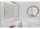 Bathroom featuring a shower-tub combo with tile and a vanity with a decorative mirror at 24540 S 190Th Ct, Queen Creek, AZ 85142