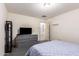 Bright bedroom featuring a TV and ample dresser storage at 25740 W Watkins St, Buckeye, AZ 85326