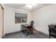 Functional bedroom with desk and chair, ideal as a home office at 25740 W Watkins St, Buckeye, AZ 85326