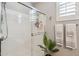 Clean bathroom with glass shower door and modern fixtures at 26019 W Ponderosa Ln, Buckeye, AZ 85396