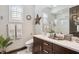 Modern bathroom with a single vanity, toilet, and walk-in shower at 26019 W Ponderosa Ln, Buckeye, AZ 85396