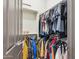 Spacious walk-in closet with ample hanging and shelving space at 26019 W Ponderosa Ln, Buckeye, AZ 85396