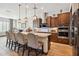 Modern kitchen with stainless steel appliances and an island at 26019 W Ponderosa Ln, Buckeye, AZ 85396