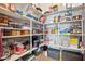 Large pantry with ample shelving for storage at 26019 W Ponderosa Ln, Buckeye, AZ 85396