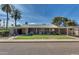 Mid-century modern home with a landscaped front yard and attached carport at 2645 E Glenrosa Ave, Phoenix, AZ 85016