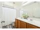 Bathroom boasts dual sinks, wood cabinets, and a modern design at 28125 N Silver Ln, San Tan Valley, AZ 85143