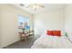 Bedroom with a TV, ceiling fan, and window at 28125 N Silver Ln, San Tan Valley, AZ 85143